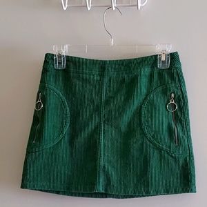 Green corduroy mini skirt